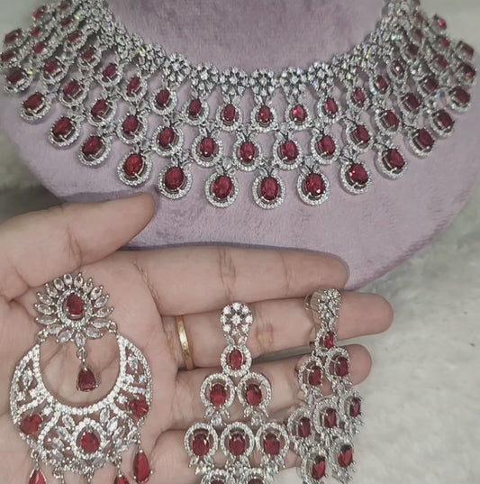 Red American Diamond Necklace with Earrings and Maangtikka, Swipe for Video, shade - Rado Red, Ruby Red