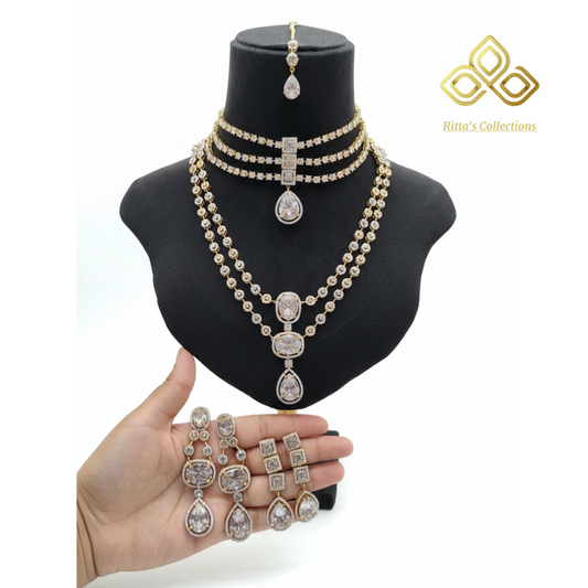 Ritta's Collections Elegant American Diamond Bridal Jewellery, 1 short necklace, 1 medium to long necklace with 2 Pair of earrings and 1 maangtikka, golden silver ganga Jamuna polish