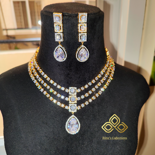 Golden American Diamond Chokar Necklace with Earrings and Maangtikka