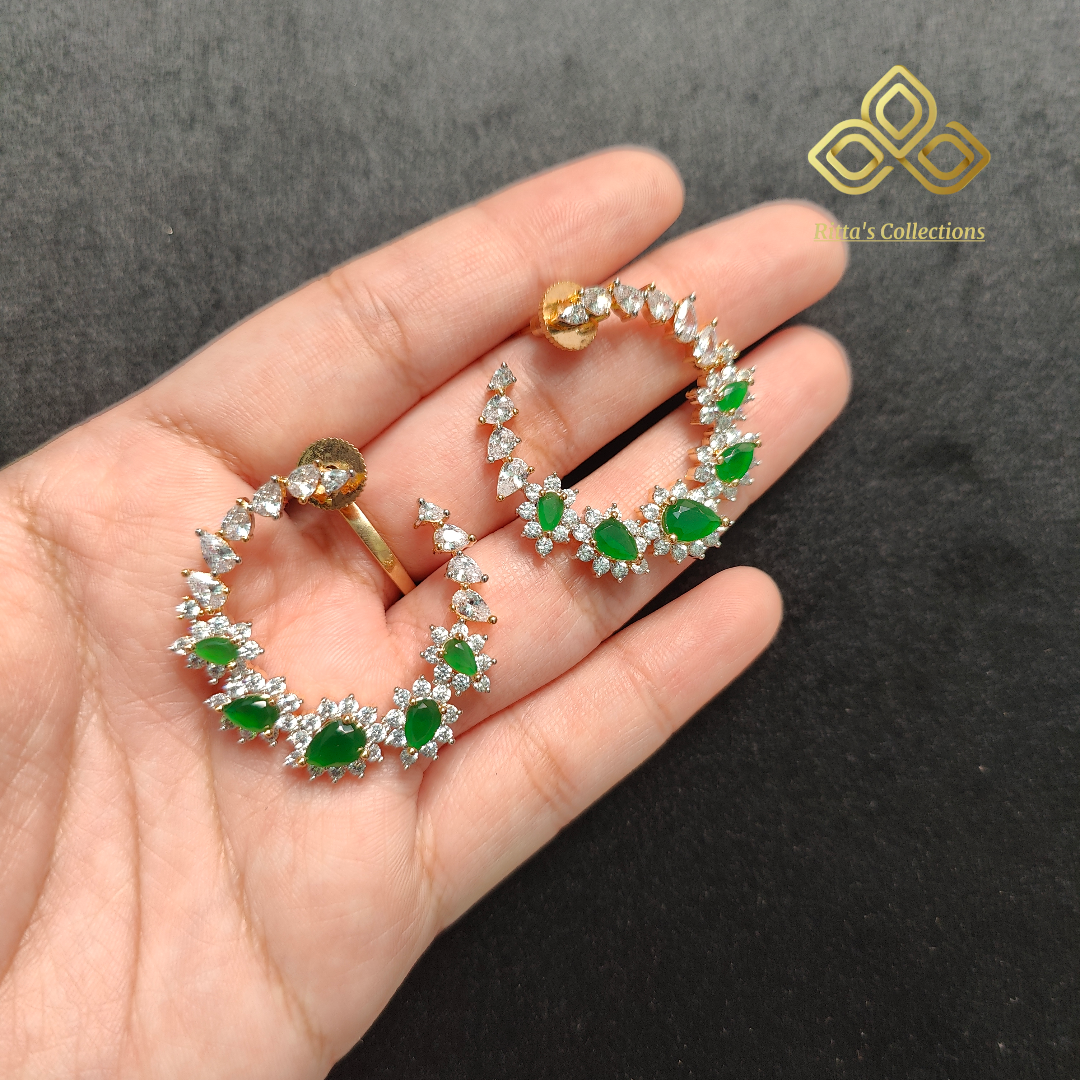 Emerald green stud earrings, gold polish